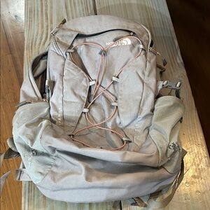 The North Face Gray Backpack with coral accents